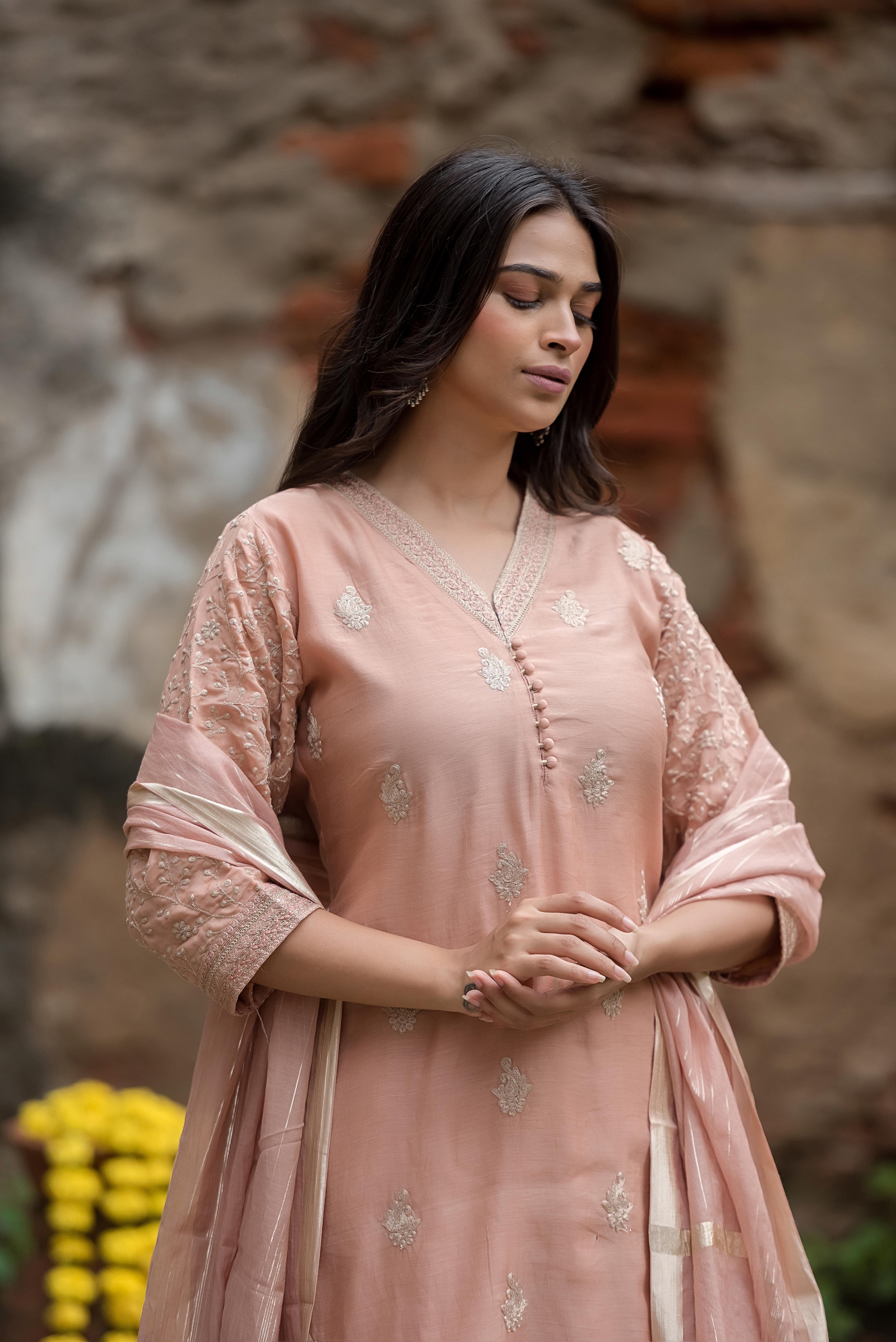 Elegant Peach Salwar Suit with Delicate Detailing