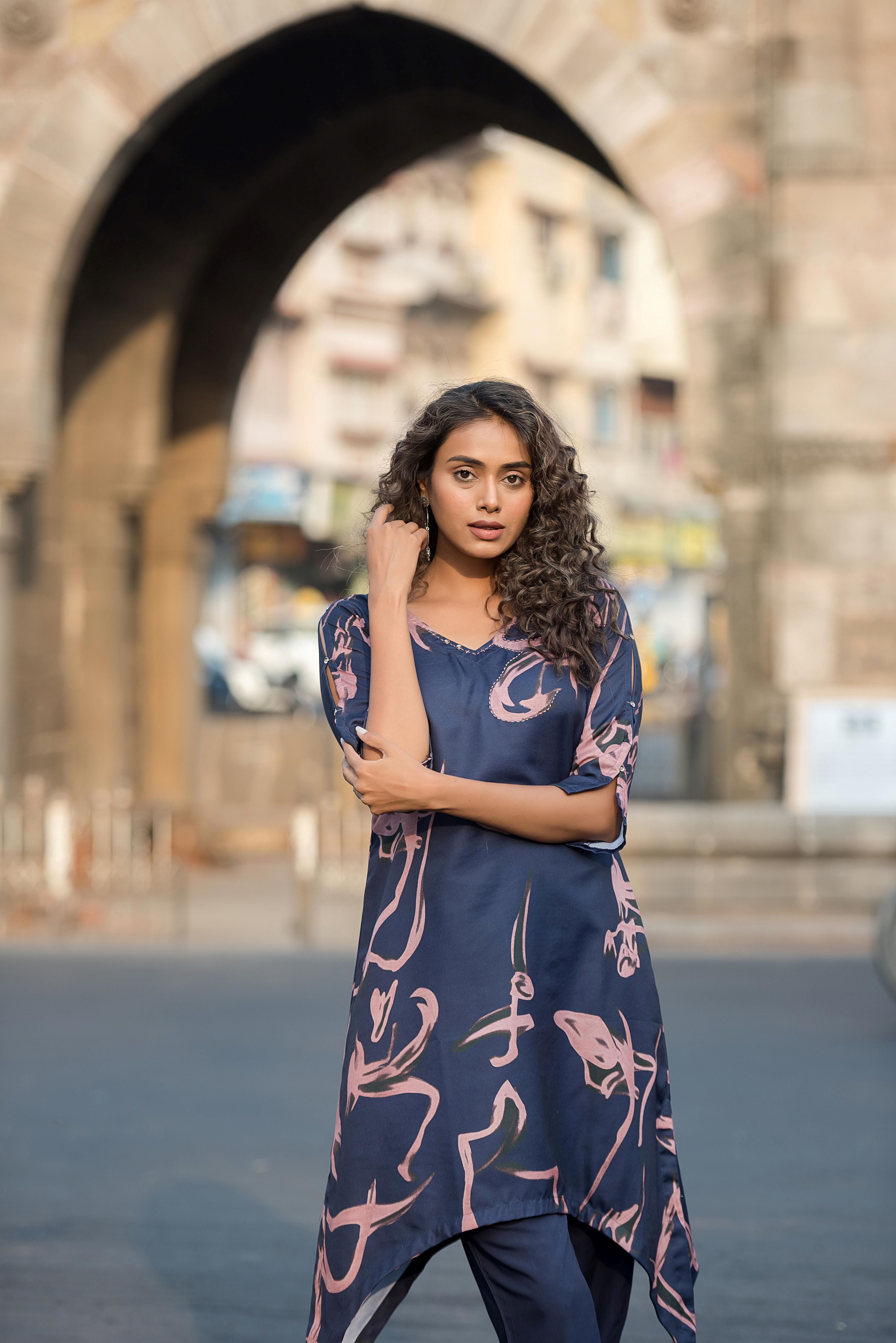 A Blue Asymmetrical Poly Muslin Kurta Set