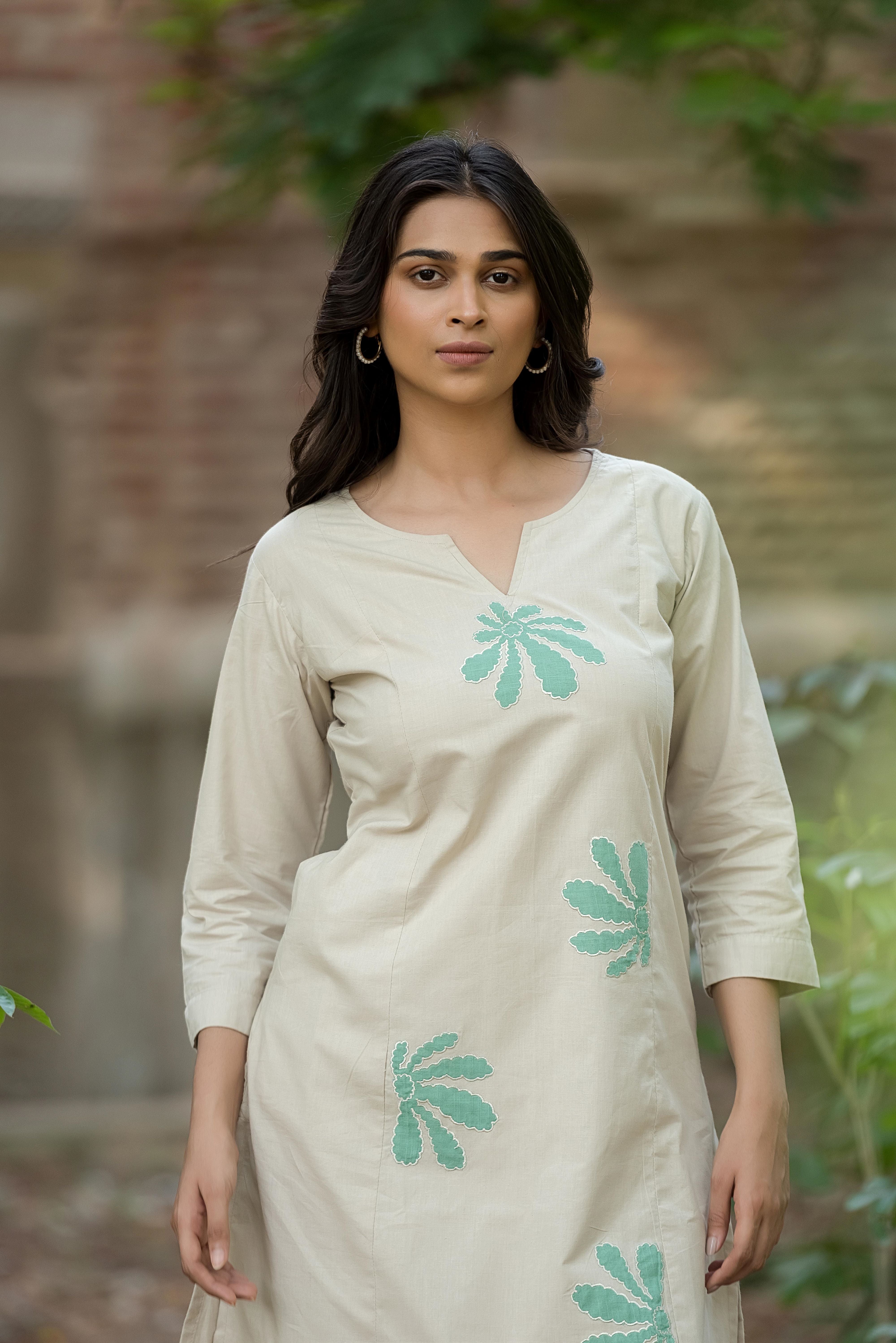 A beige cotton A-line Kurta Set