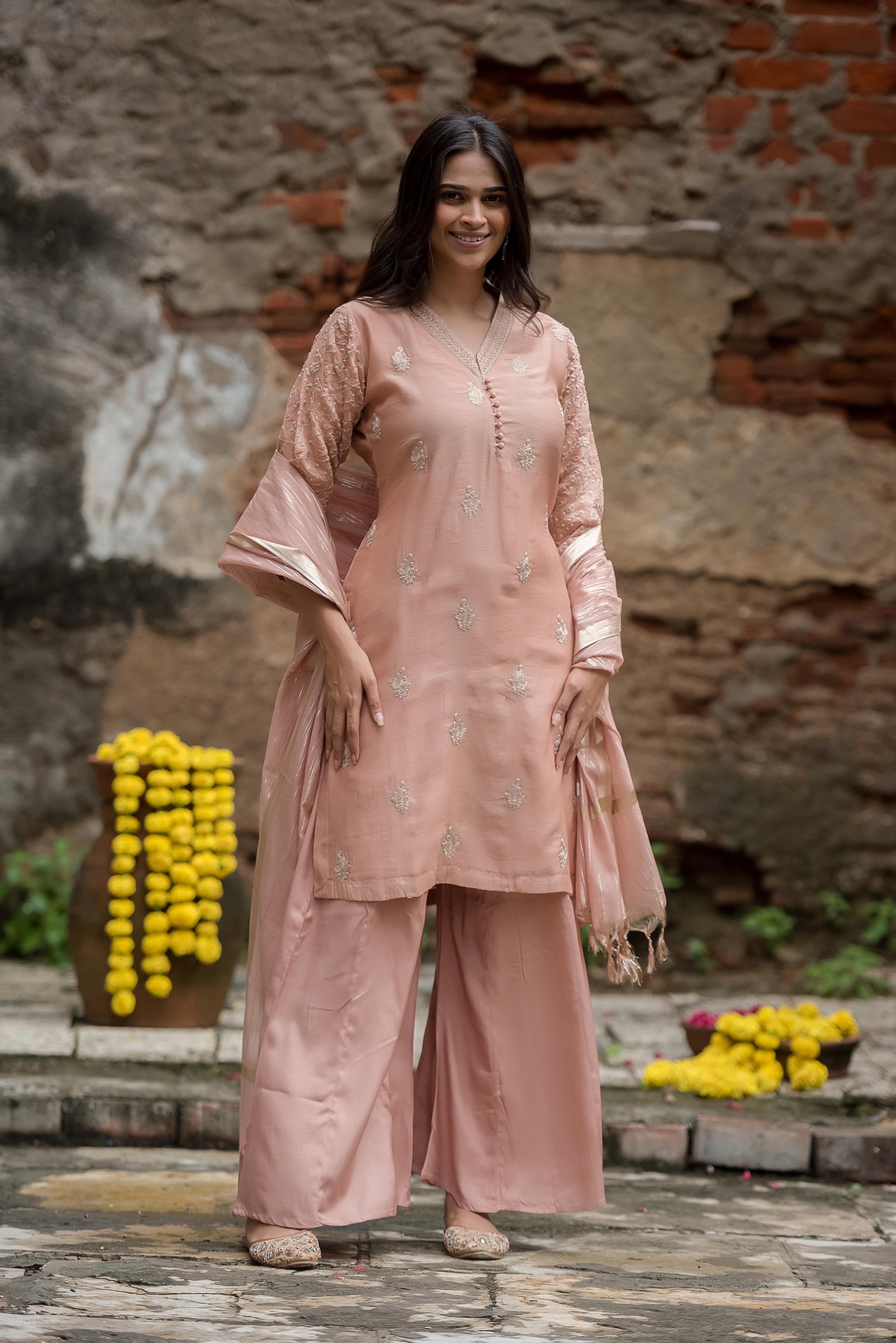 Elegant Peach Salwar Suit with Delicate Detailing