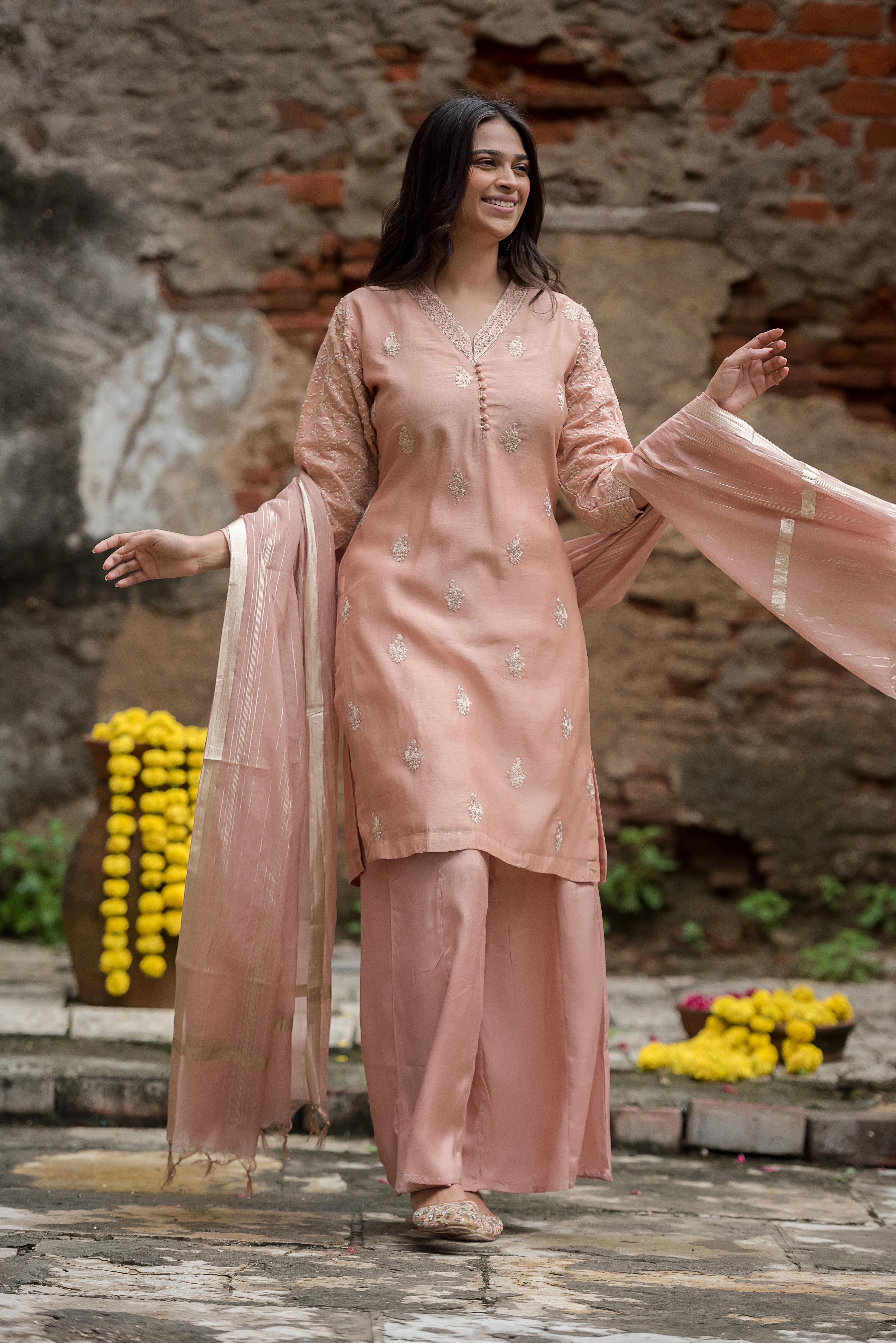 Elegant Peach Salwar Suit with Delicate Detailing