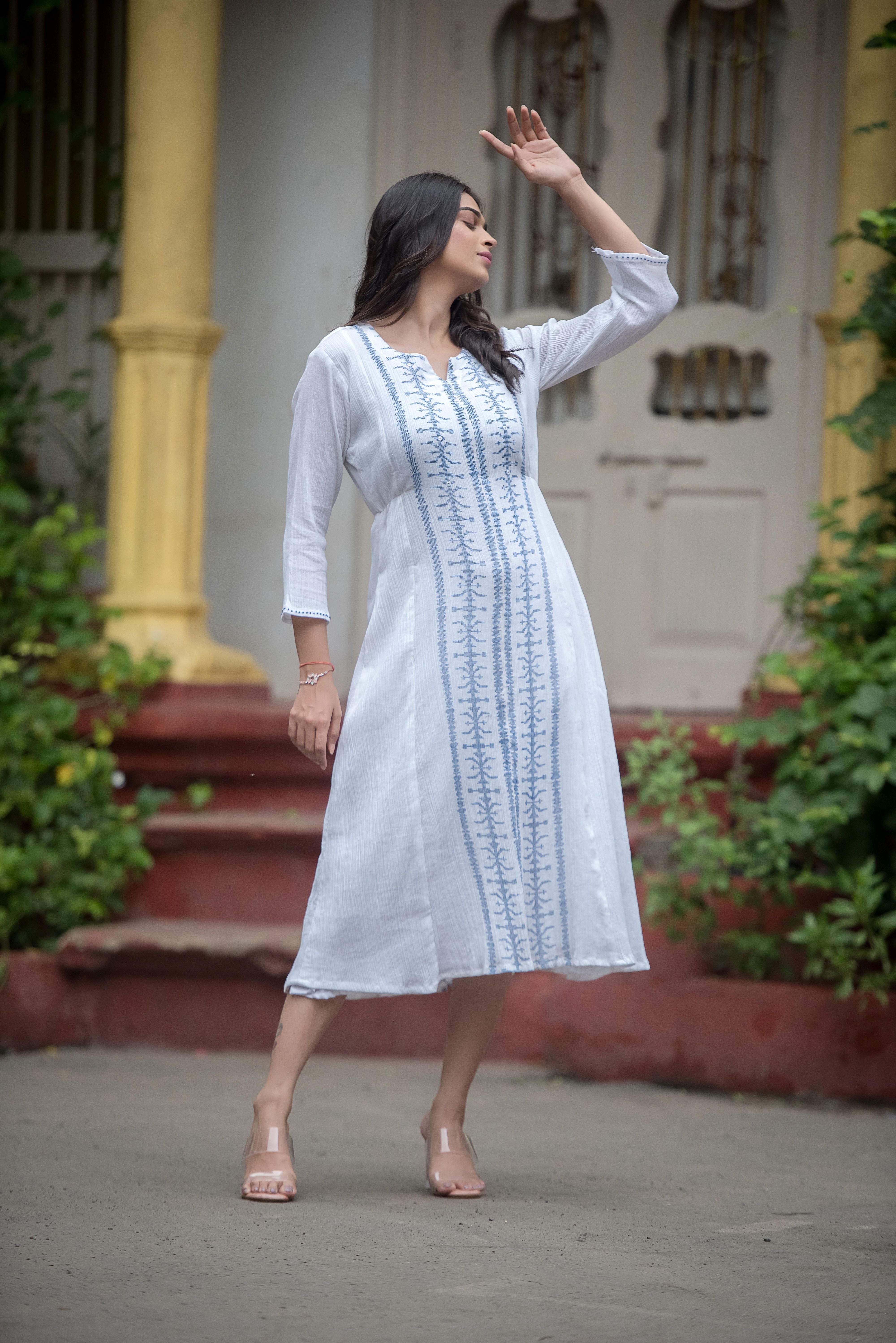 Graceful White Anarkali with Intricate Detailing