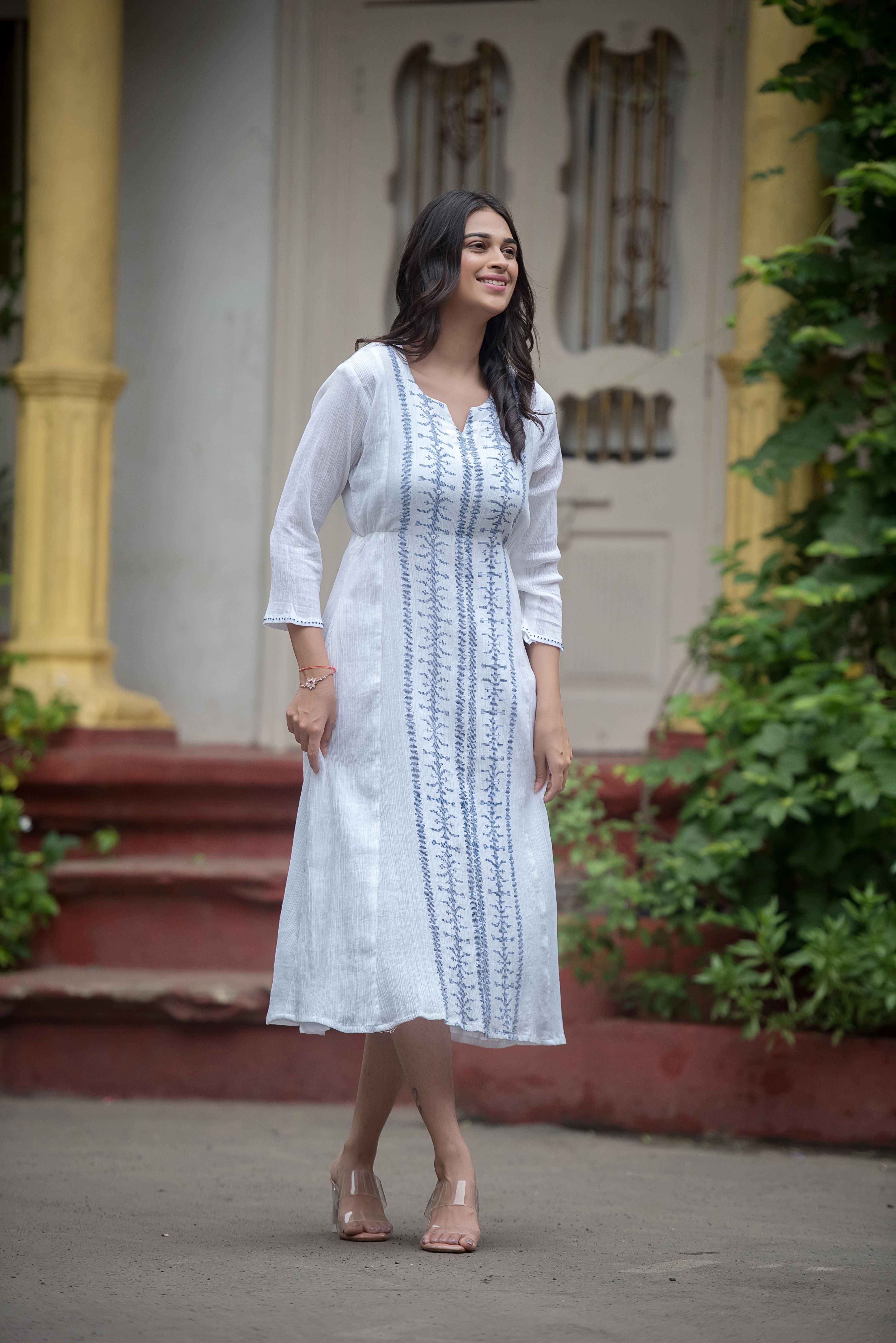 Graceful White Anarkali with Intricate Detailing