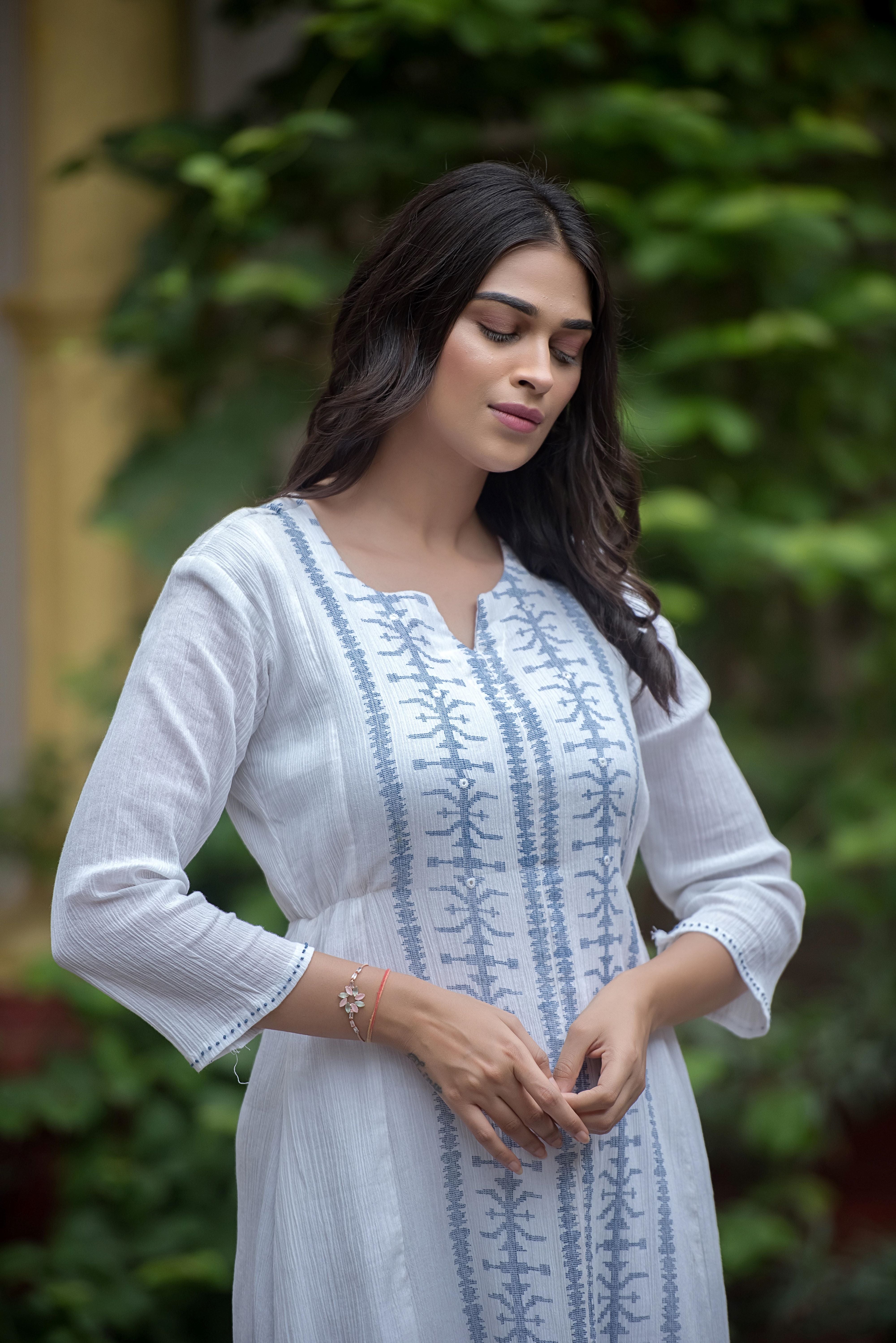 Graceful White Anarkali with Intricate Detailing
