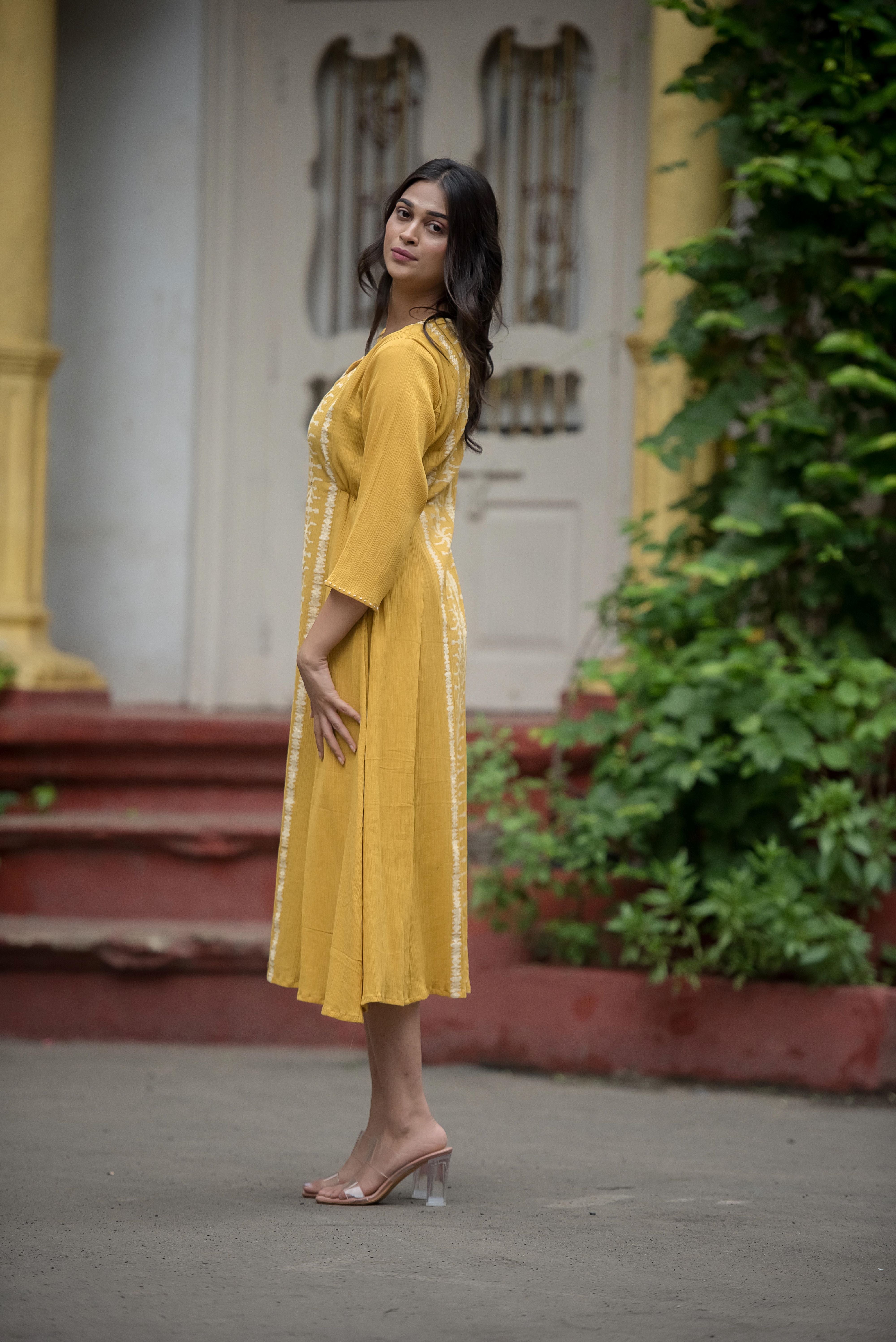 Graceful Yellow Anarkali with Intricate Detailing