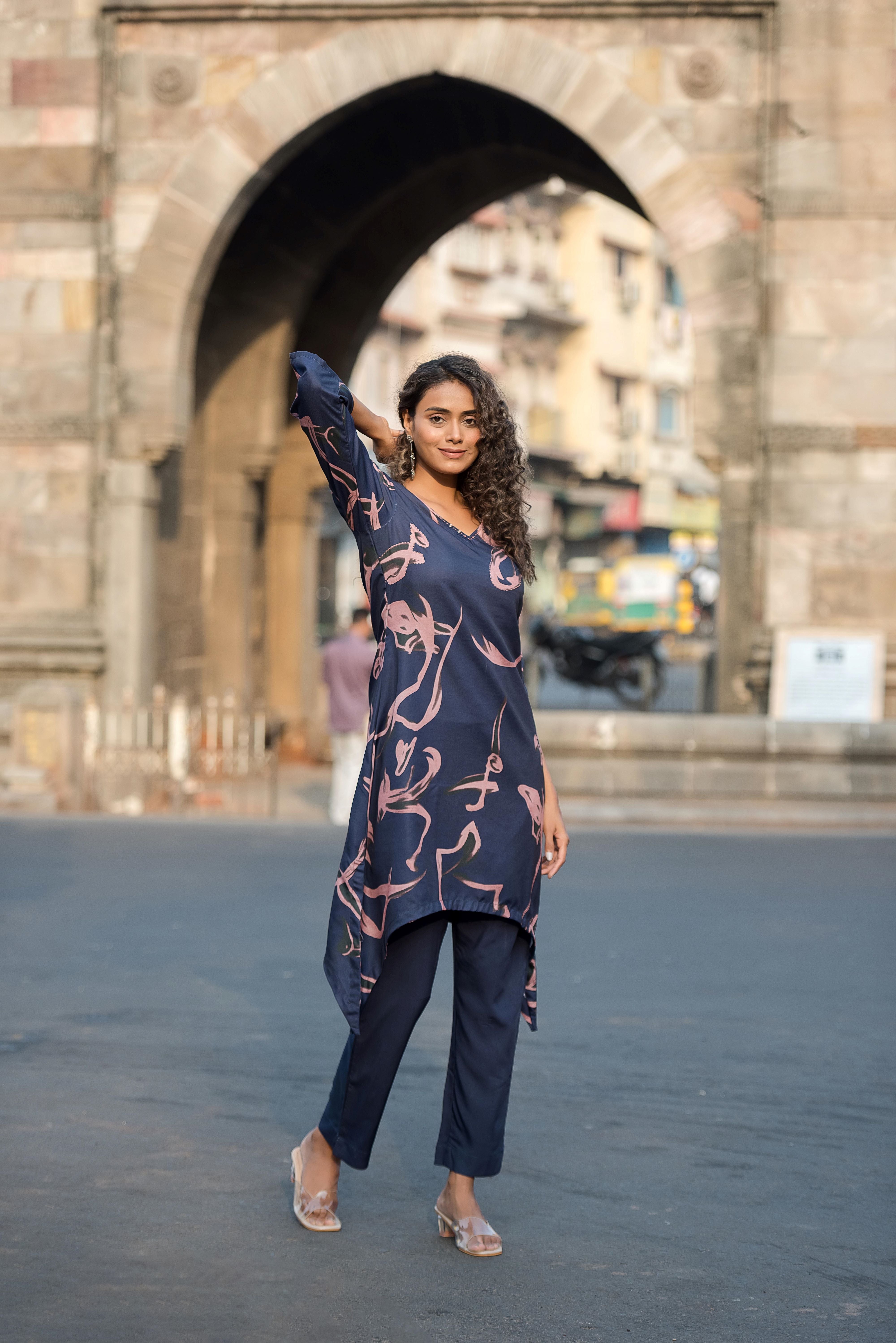 A Blue Asymmetrical Poly Muslin Kurta Set