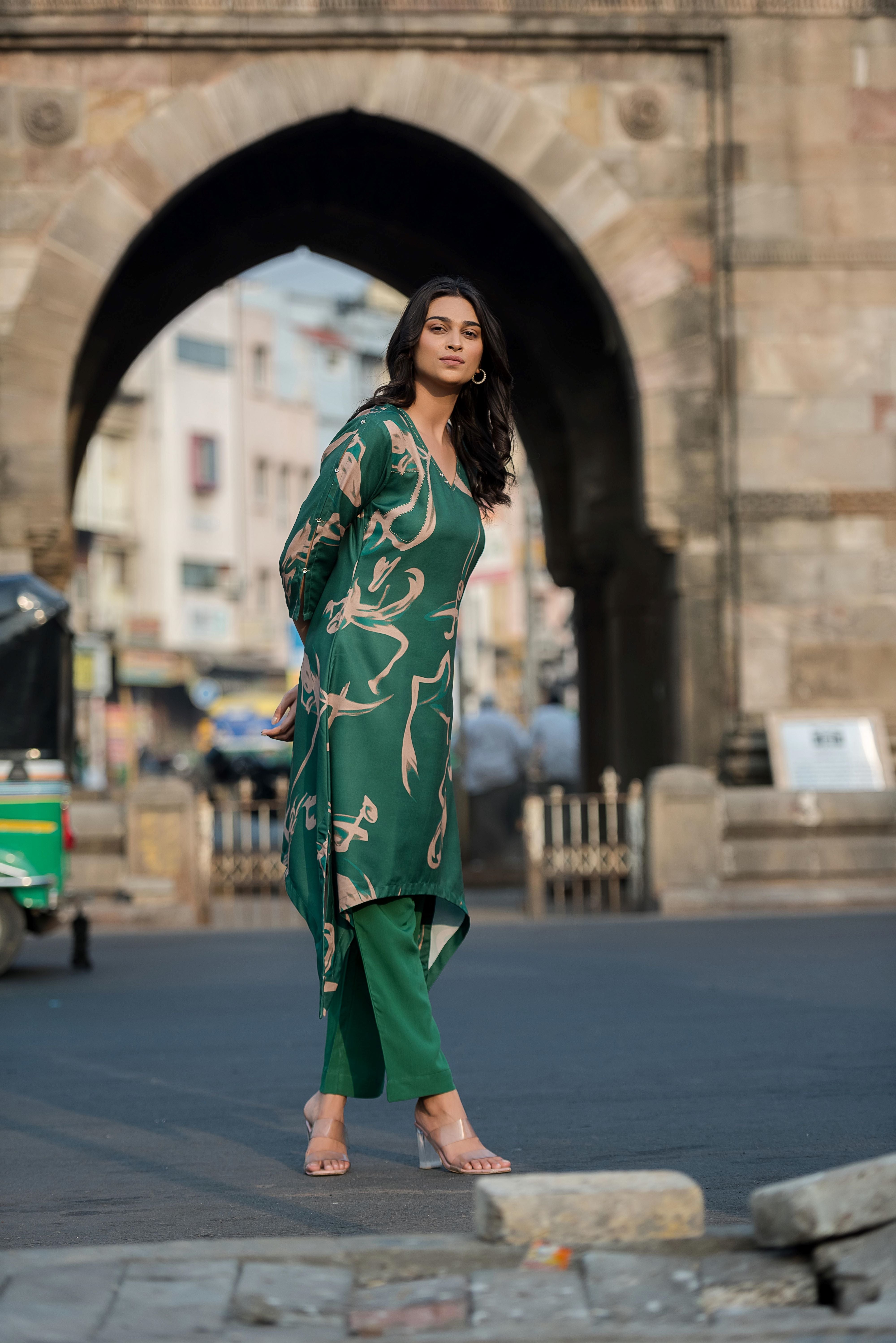 A Green Asymmetrica Poly Muslin Kurta Set
