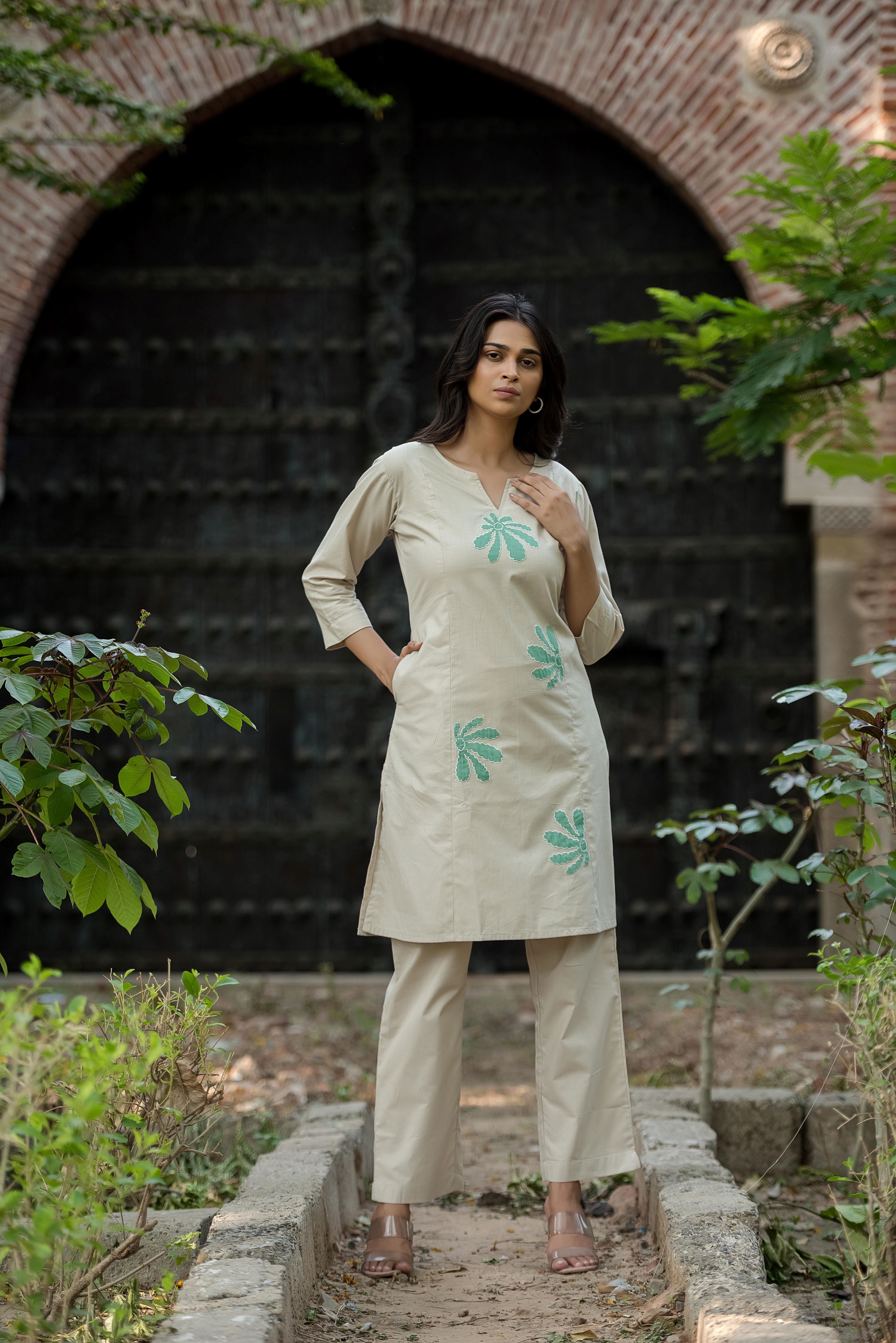 A beige cotton A-line Kurta Set